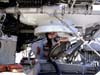 Grad student, Gabby Barbarite, emerges from the aft compartment of the JSL II after her first submersible dive.