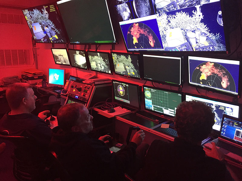 The Pelagic Research Services team navigating ROV Odysseus on a dive during the 2017 Southeast Deep Coral Research expedition aboard NOAA Ship Nancy Foster. From left to right: Jesse Doren, Kris Ingram, and Erik Hodges.