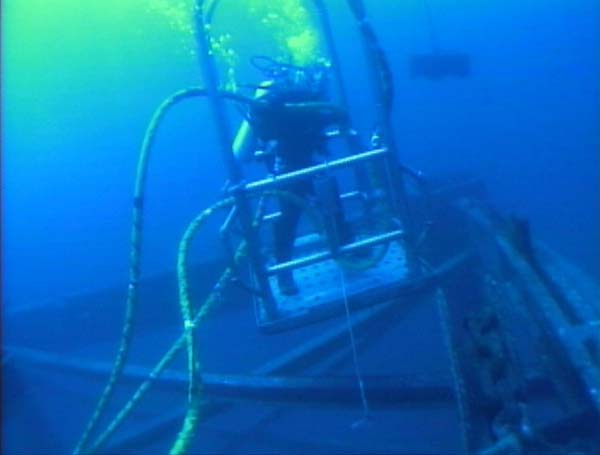 Navy diver preparing to leave the diving stage