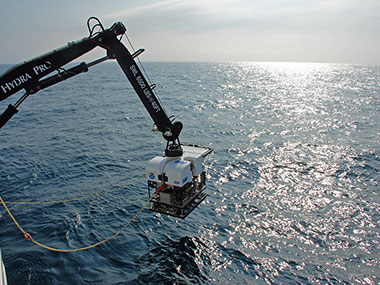 NOAA's new deepwater remotely operated vehicle, Deep Discoverer (D2), is deployed off the fantail of the ship for the first dive of the expedition.