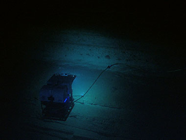 NOAA’s Seirios camera sled images ROV Deep Discoverer during exploration of the eastern wall of Alvin Canyon during a dive on July 18, 2013.