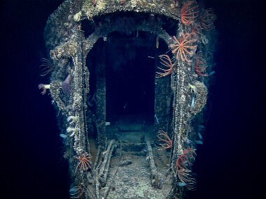 The rounded stern of the USS Baltimore was modified to include doors and deployment rails for laying sea mines during WWI.