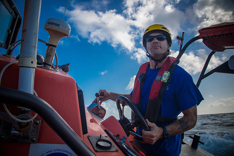 Chief Boatswain Jerrod Hozendorf drives the Fast Rescue Boat during training exercises.