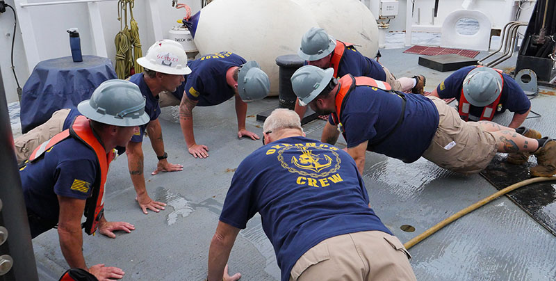 A push-up contest on deck.